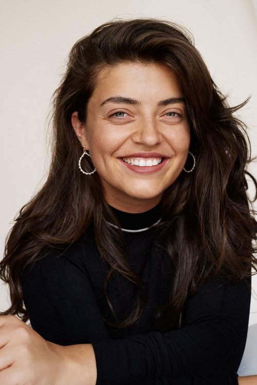 Altine Emini as Moderatorin Shirin