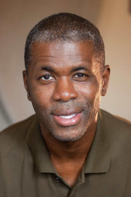 Mo Sesay as (Archival)