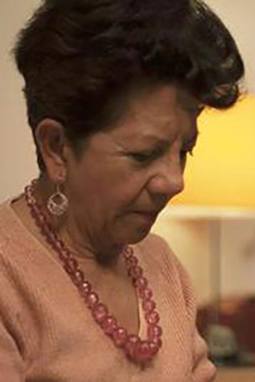 Clara Monroy as Aunt Elisa