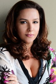 Renata Castro Barbosa as Claudia