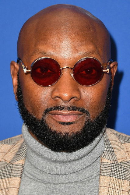 Patrik-Ian Polk as Caprice Films Entourage Member