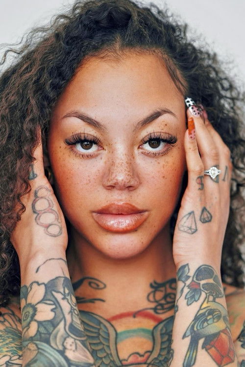 Miryam Lumpini as Self - Tattoo Artist