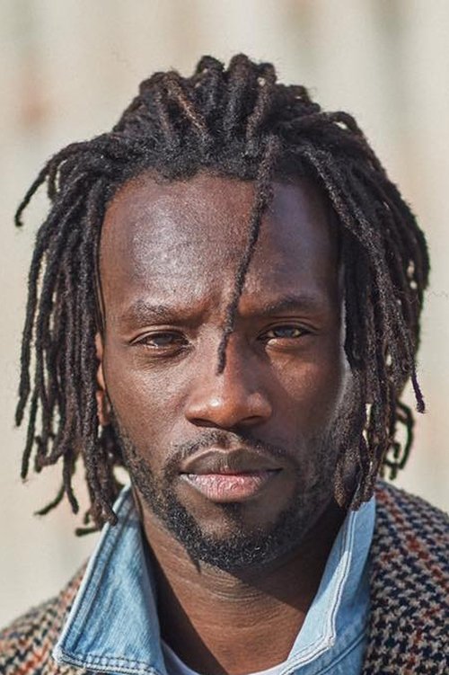 Ibrahima Ba as Adama