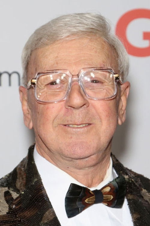 Dirk Yates as Mr. Wiseman Studio Head