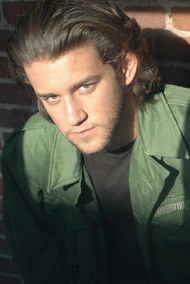 Cal Thomas as Elliott Smithe