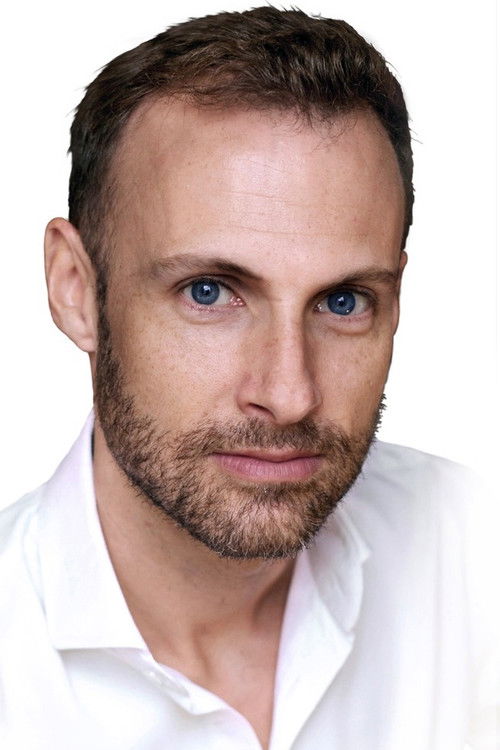 Flannan Obé as Hartmann