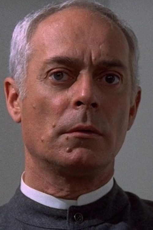 Jean Martin as The Priest