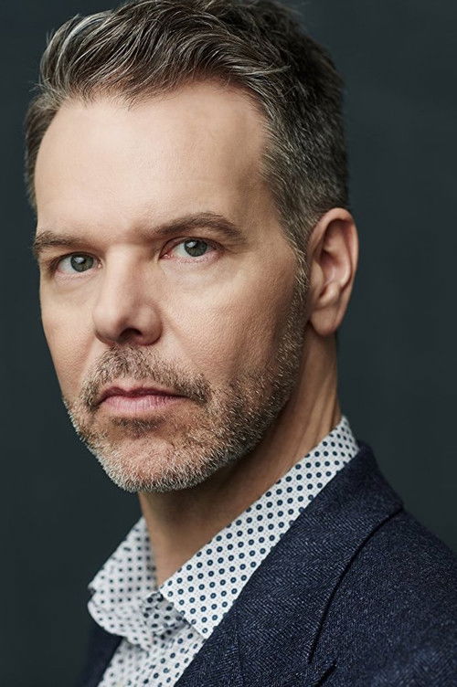 Greg Ainsworth as Back Room Denizen