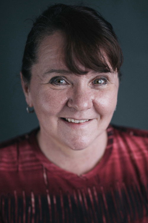 Evie Moores as Firefighter Wife (uncredited)