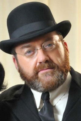 James Lee Guy as Prison Interrogator