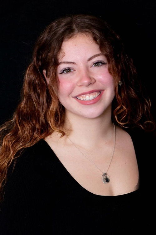 Charity Humphreys as Roadside Phone Operator