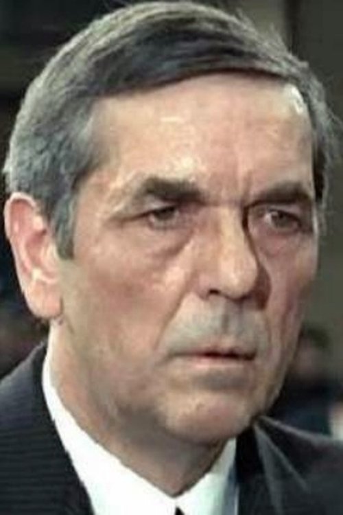 Claude Vernier as Dr. Gerhard Kramer