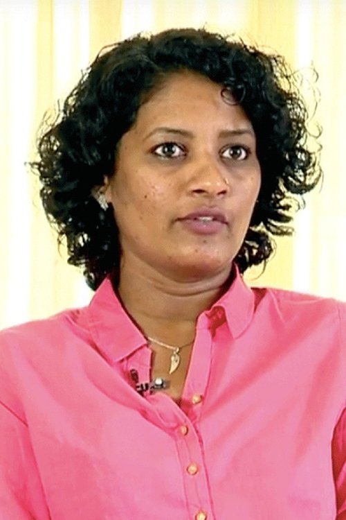 Abhija Sivakala as Pavithran's wife