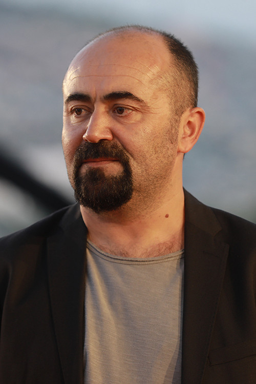 Yılmaz Özdil as Anwar (The Hanged Man)