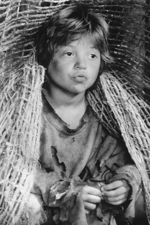 Justin McGuire as The Kid