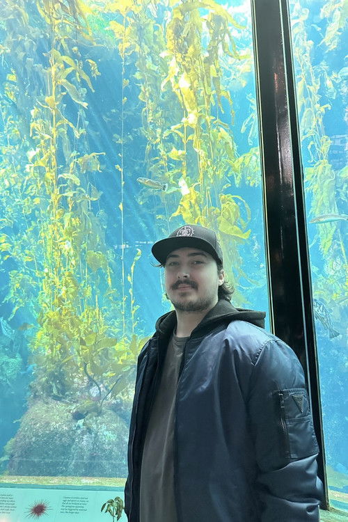 Maxwell Nagy as Johnny Greenthumb (mentioned)