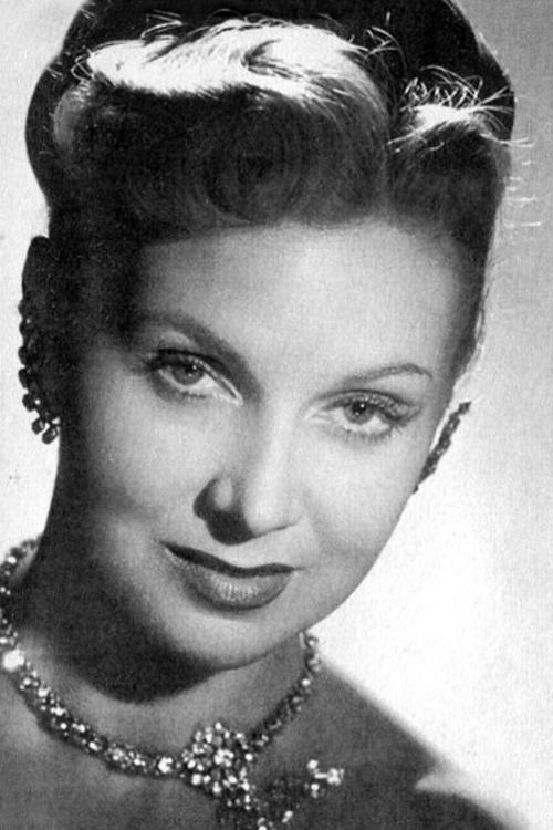 Simone Paris as The Landlady