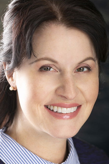 Kate Jo Hughes as Leader (Secretary)