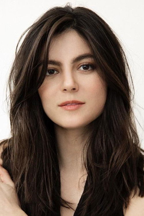 Monica Barbaro as Maya