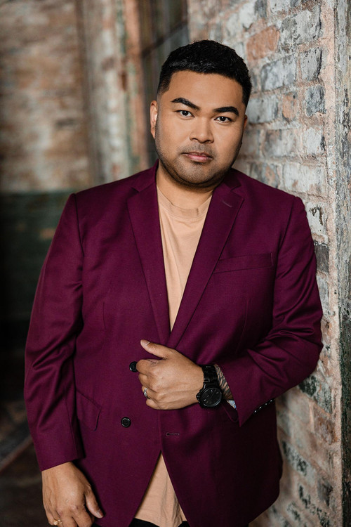 Robbie Ambrosio as Caroller #5