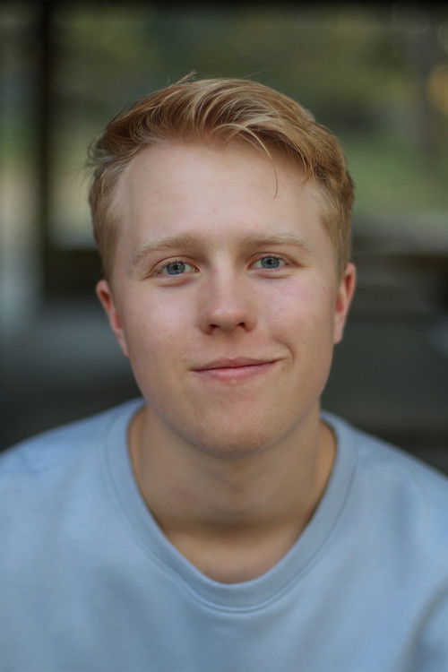 Owen Ljunggren as Chief Mathies (voice) / News Anchor 1 (voice)