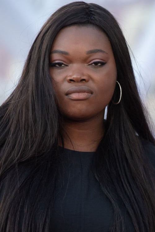 Guslagie Malanda as Laurence Coly