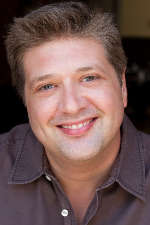 Lance Barber as George Cooper