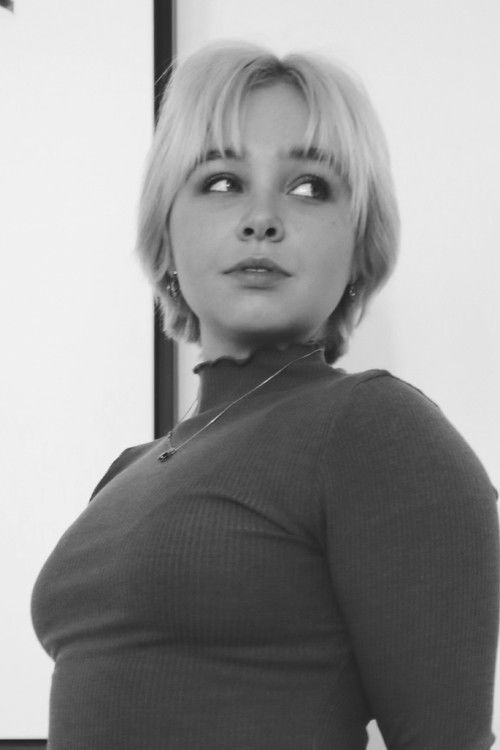 Reese Hildner as Charlie