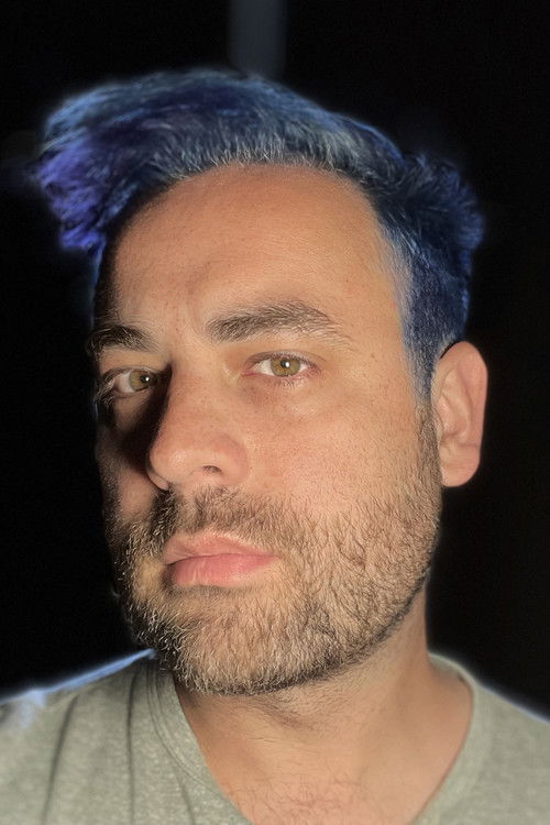 Alastair Clayton as Tom/Caplan