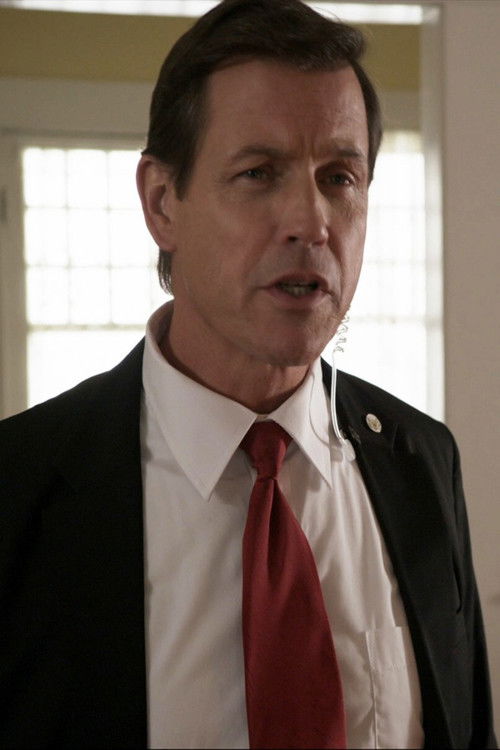 Brent Mendenhall as George W. Bush