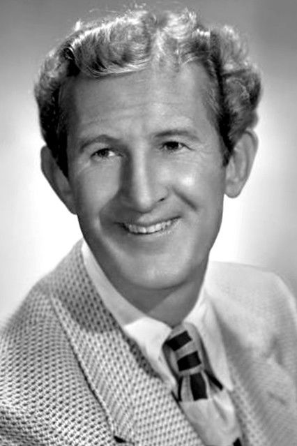 Doodles Weaver as Fisherman Helping with Rental Boat