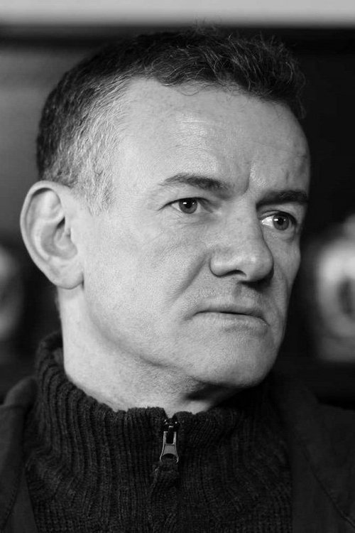 Malcolm Shields as Young