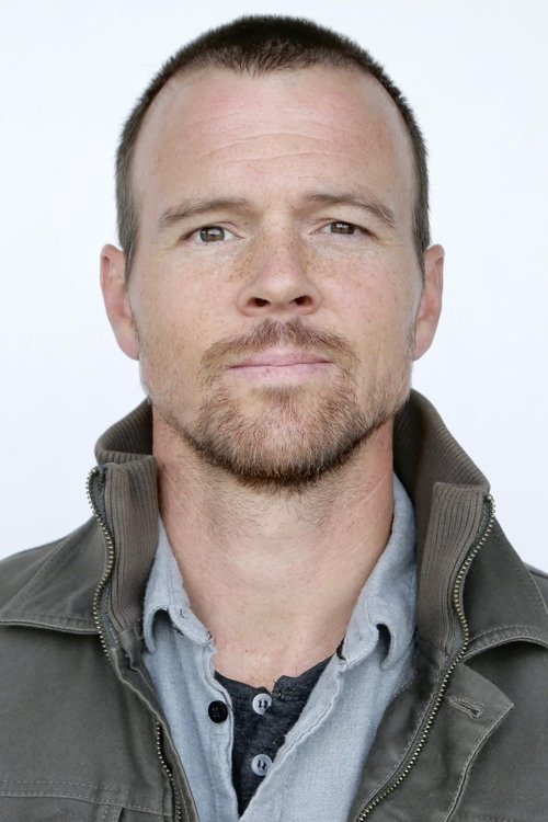 Zac Titus as Mike Dean