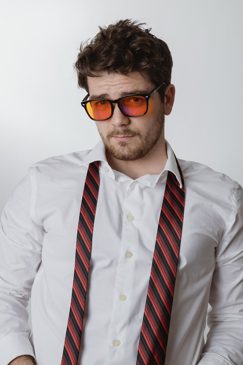 Aidan McKee as Coffee Shop Enjoyer / Robber / Partygoer