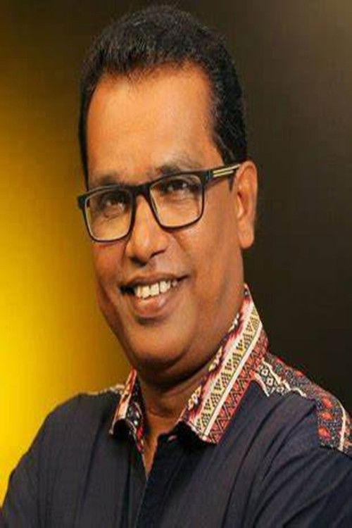 Mani Shoranur as Girirajan