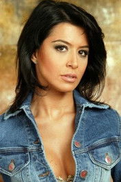 Simona Pătruleasa as Female News Anchor