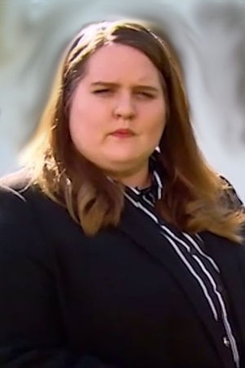 Giulia Becker as Woman Next to TV Reporter