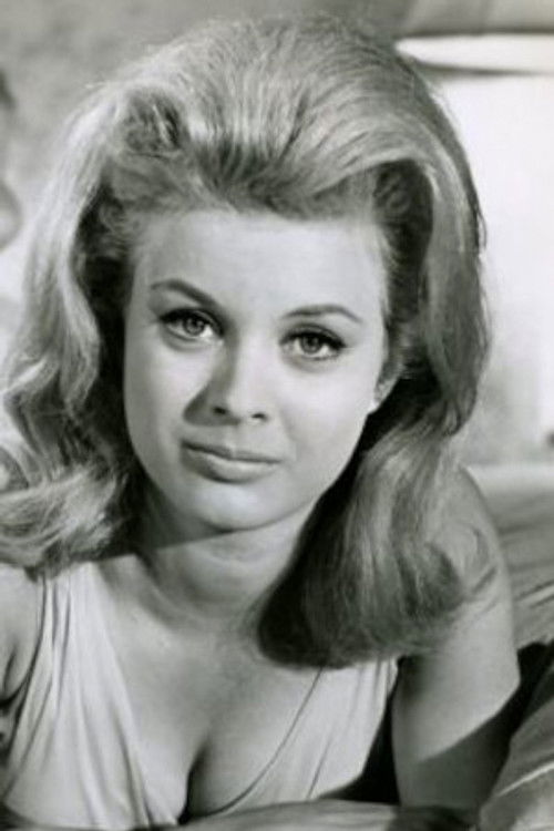 Marilyn Devin as George