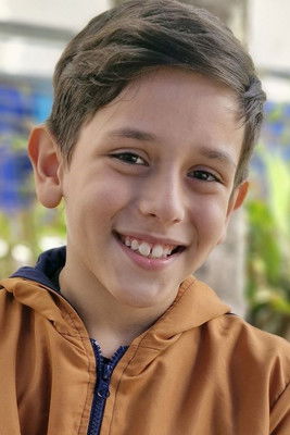 Lucca Almeida as Boy in the Bike