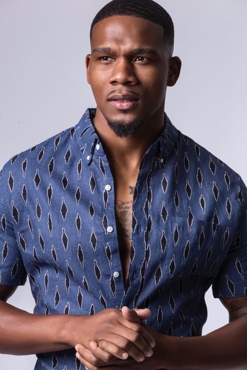 Adrian Lockett as Facial Tattoo Guy