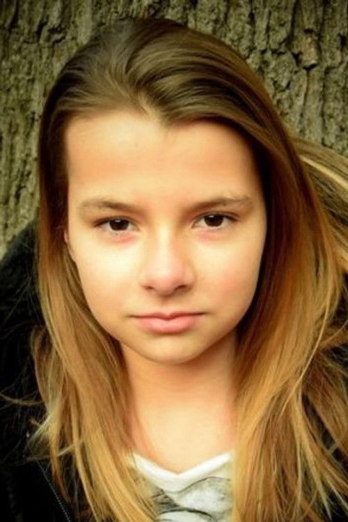 Elisabeth Bellé as Greta Frerich