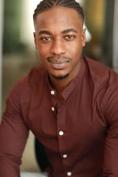 Moussa Fomba as Black, Charles