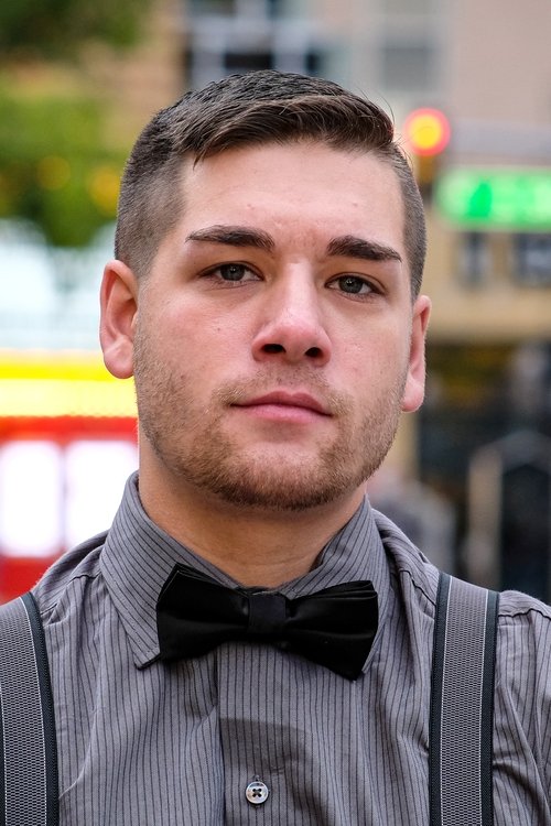 Caleb Silvers as Theater Director