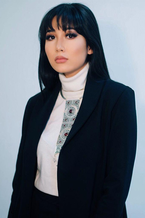 Ayim Seytmetova as Madina