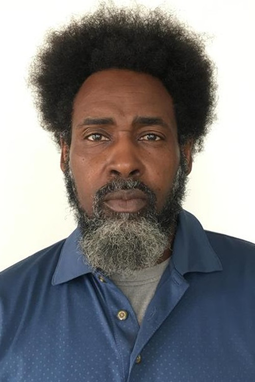 Hector Johnson as Doorman