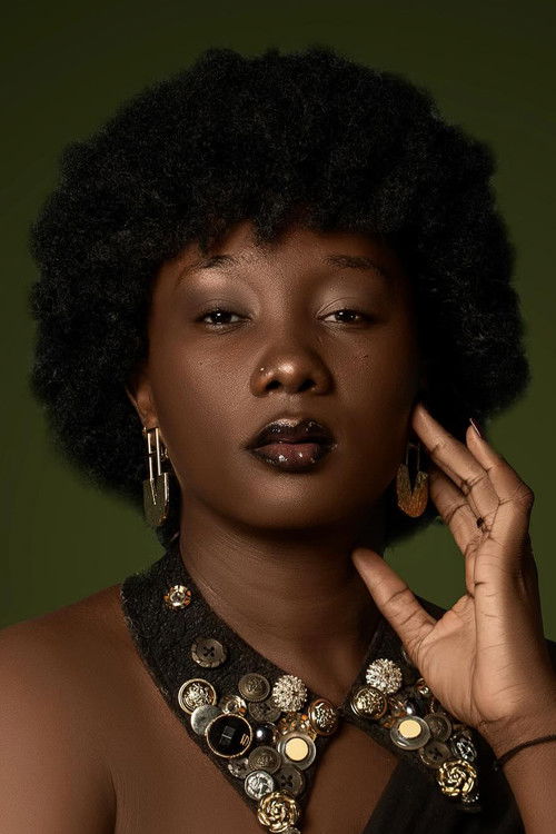 Brigitte Tchanégué as Aïcha