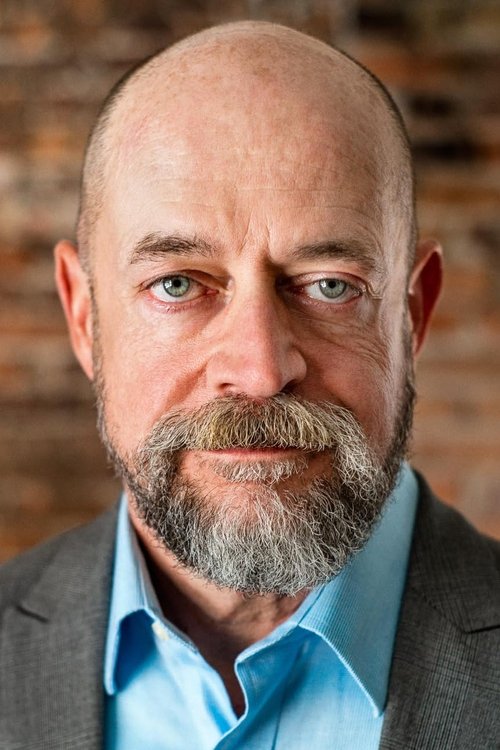 Chris Enright as Schultz - Helicopter Pilot