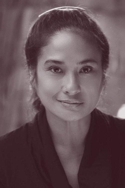 Sue Prado as Miss Taas