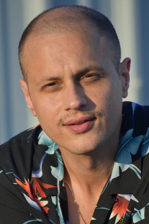 Khan Baykal as The Salesman