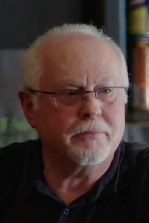 Ed Berke as Ambulance Driver